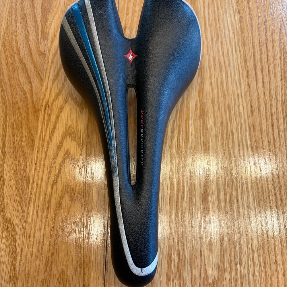 Specialized Jett bike seat with titanium rails, black with white and blue detail